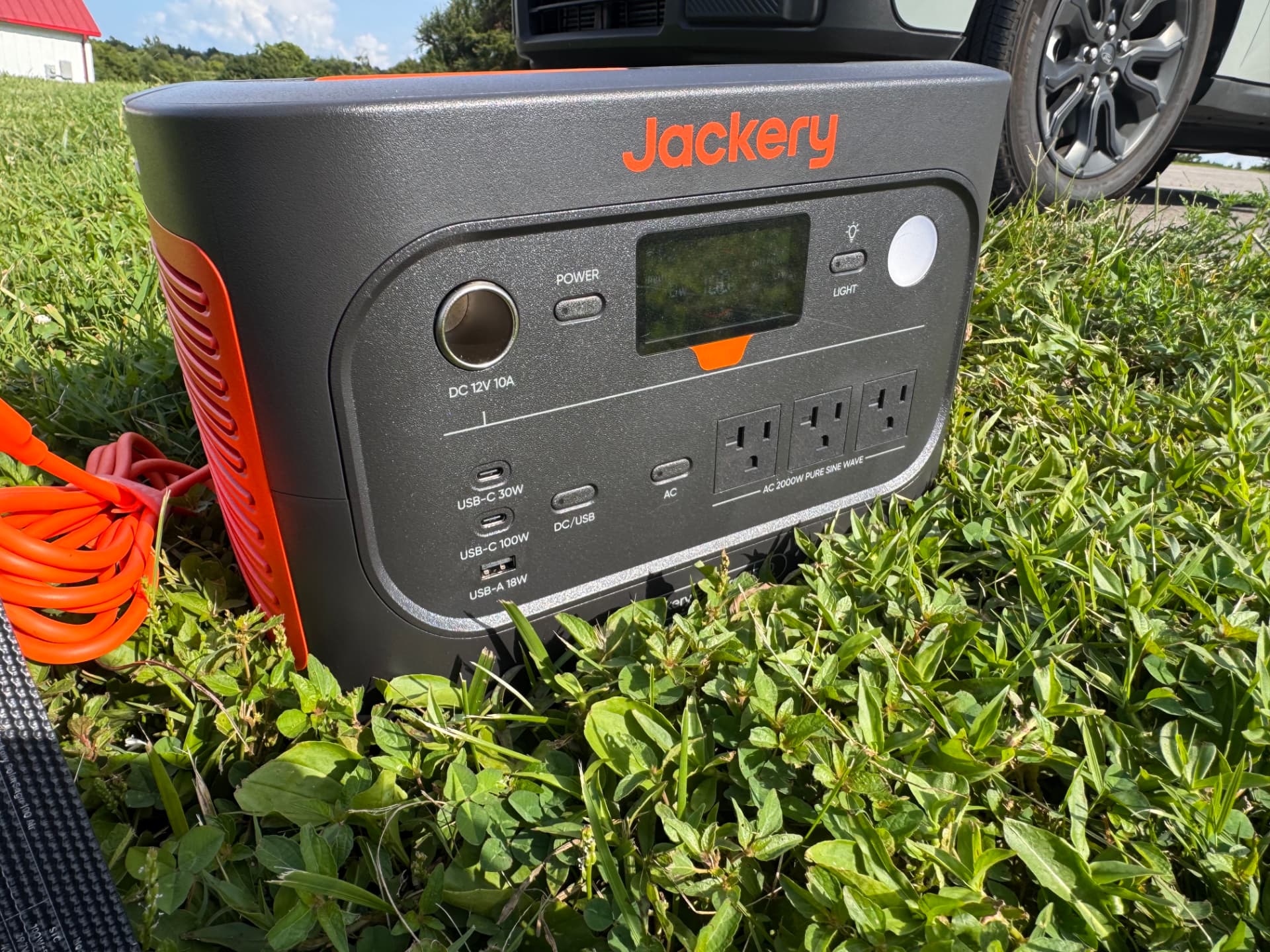Close-up of the Jackery Explorer 1500 outputs, display screen and built-in light