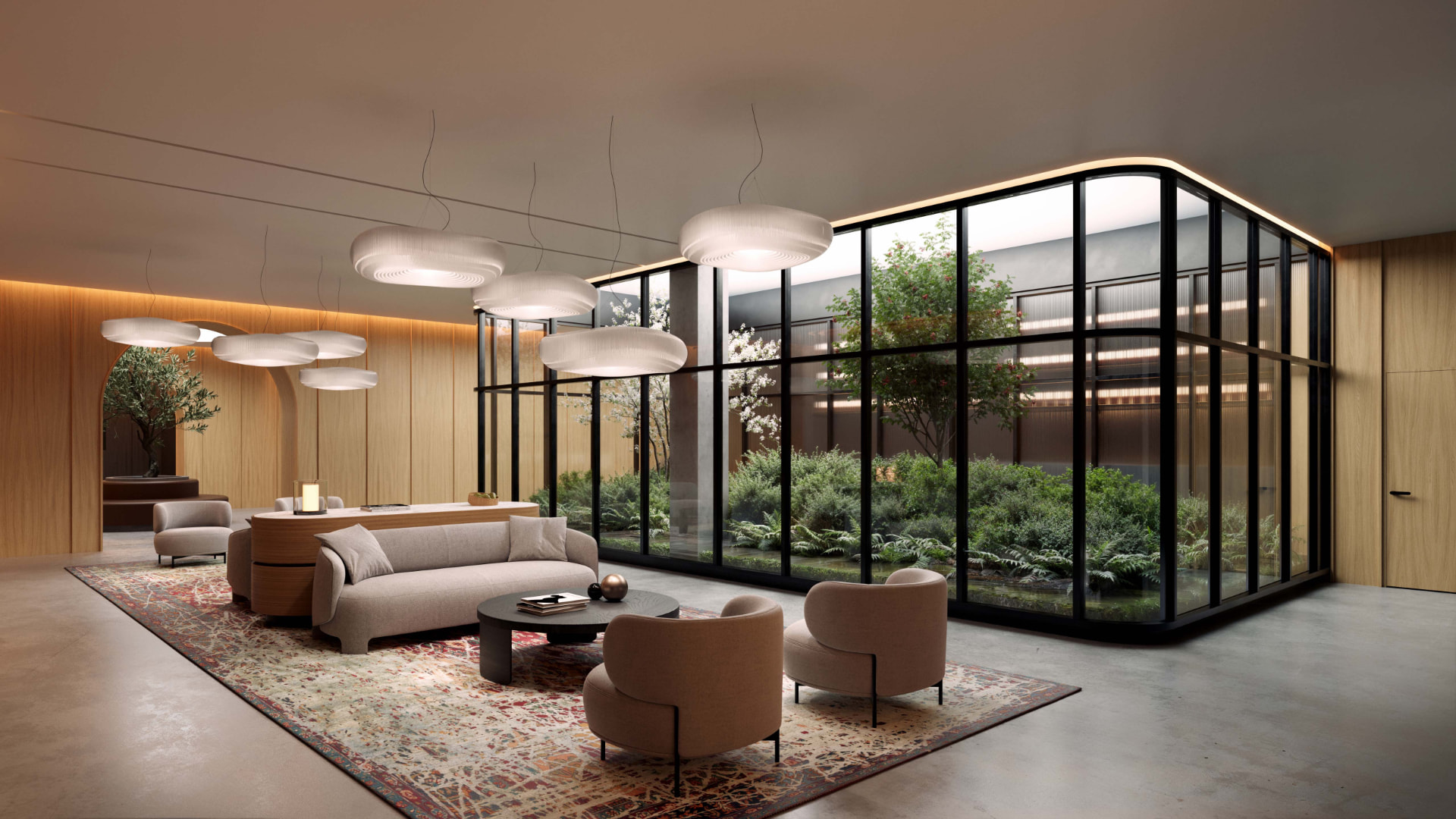 Developer rendering of a lobby lounge with pendant lights, a patterned rug and a glazed wall onto a planted sunken courtyard