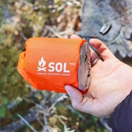 Oange SOL Emergency Bivvy packed in its stuff sack.